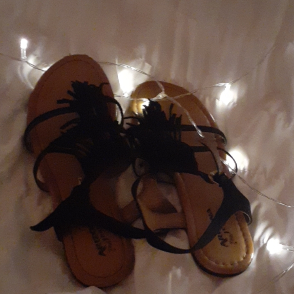 Black tassel shoes